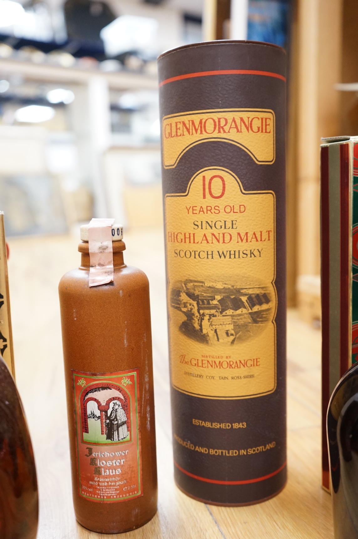 A bottle of Glenmorangie Scotch whisky and five other cased spirits